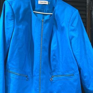 Turquoise jacket with silver zipper